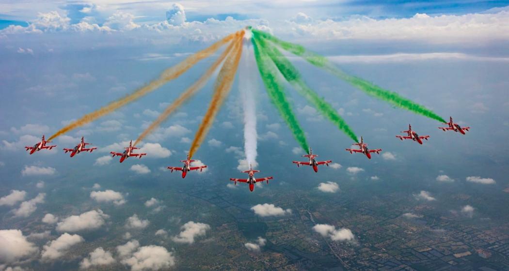 Surya Kiran Aerobatic Team planes perform a precision flypast.