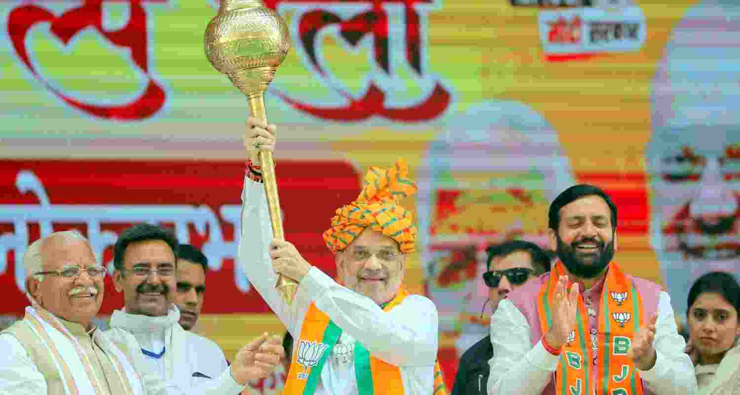 Amit Shah rallies in Haryana, accompanied by Nayab Singh Saini. 