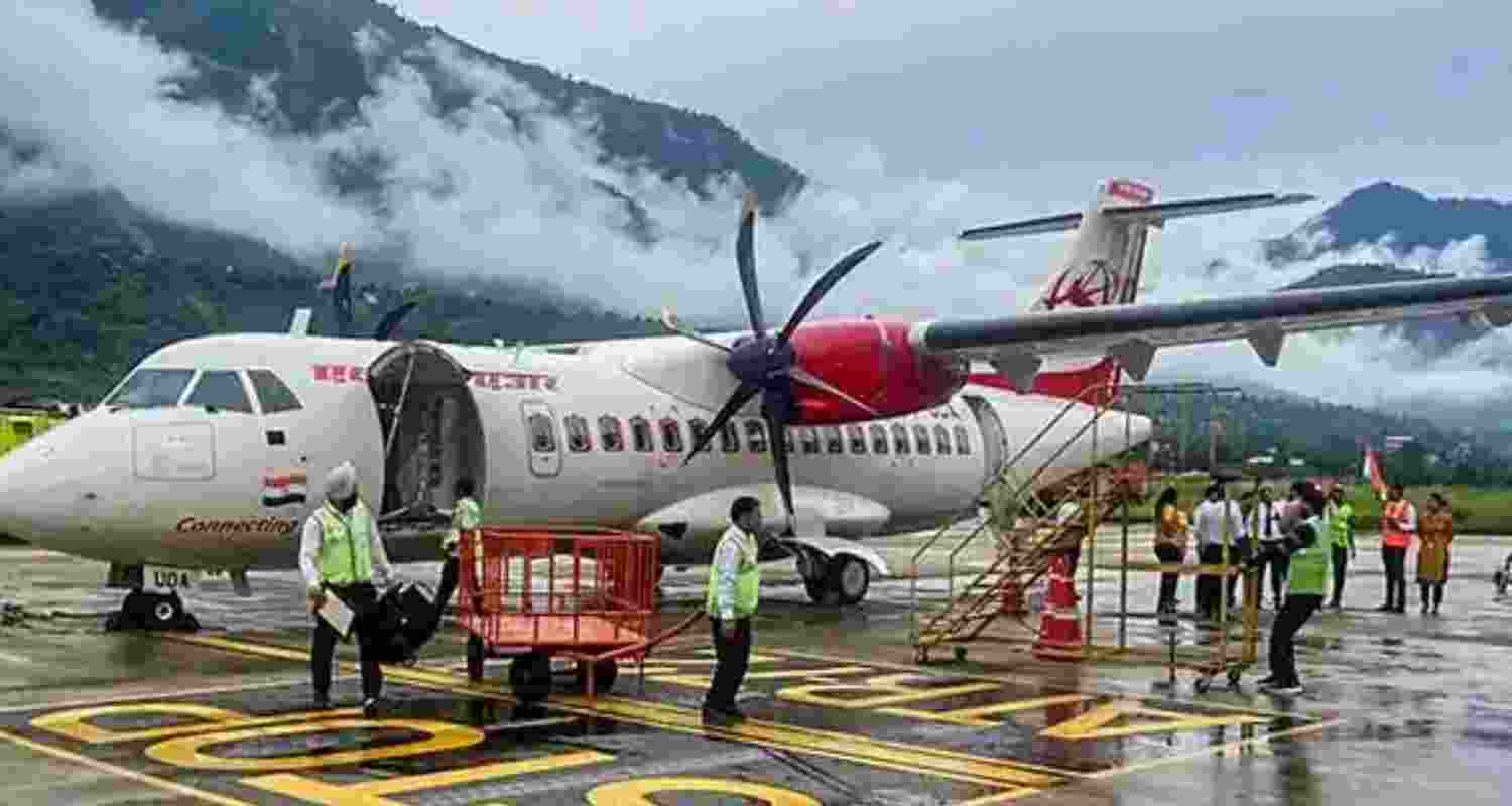 A flight landed at Himachal Pradesh Shimla airport. Himachal expects cheaper air travel and increased import duties on apples, so as to boost the apple economy of the state