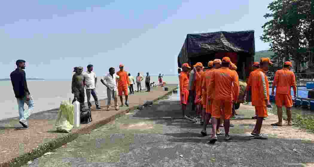 NDRF personnel preparing for a search operation in the Chandil dam area.