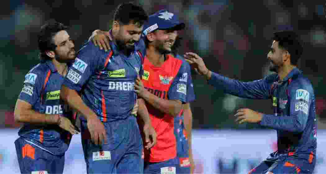 Team-mates cheer as Avesh Khan celebrates after delivering a match-winning final over against Rajasthan Royals, sealing a thrilling two-run win for Lucknow Super Giants at Sawai Mansingh Stadium.
