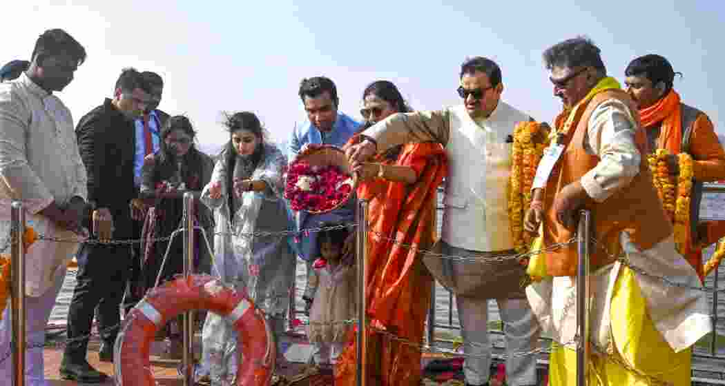 Adani Group Chairman Gautam Adani with his family performs 'puja' at Sangam during the Maha Kumbh Mela 2025, in Prayagraj, Uttar Pradesh on Tuesday, Jan. 21, 2025. Adani Group Chairman Gautam Adani with his family performs 'puja' at Sangam during the Maha Kumbh Mela 2025, in Prayagraj, Uttar Pradesh on Tuesday, Jan. 21, 2025.