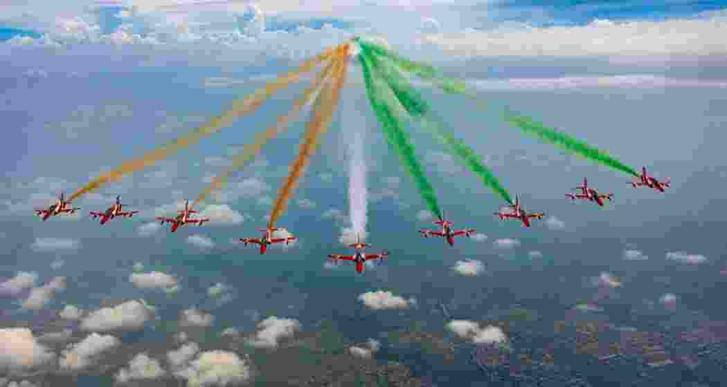 Surya Kiran Aerobatic Team planes perform a precision flypast.