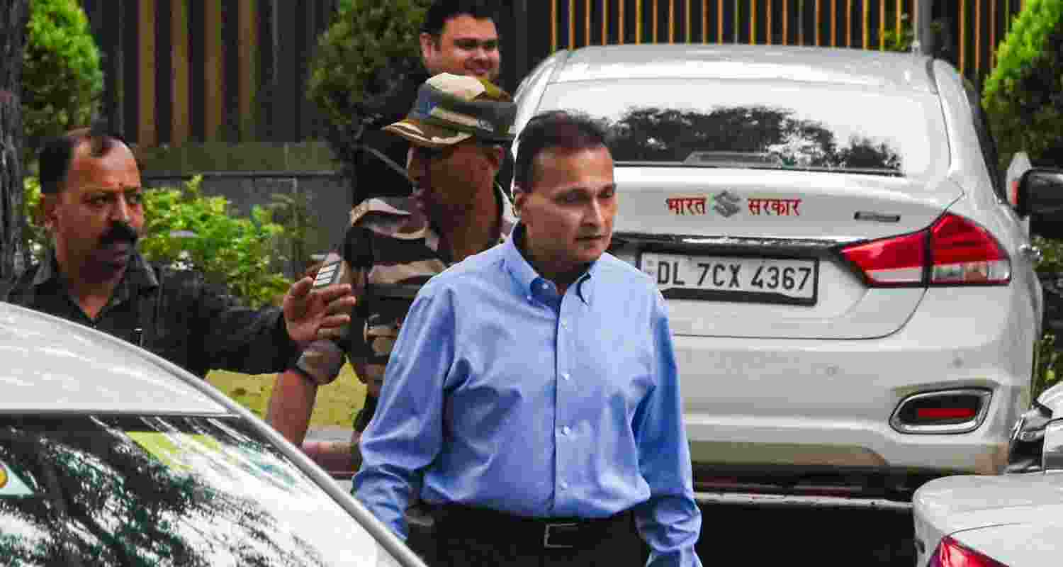Industrialist Anil Ambani arrives to appear before the Enforcement Directorate for questioning in a money laundering case linked to alleged multiple bank loan frauds, in New Delhi.