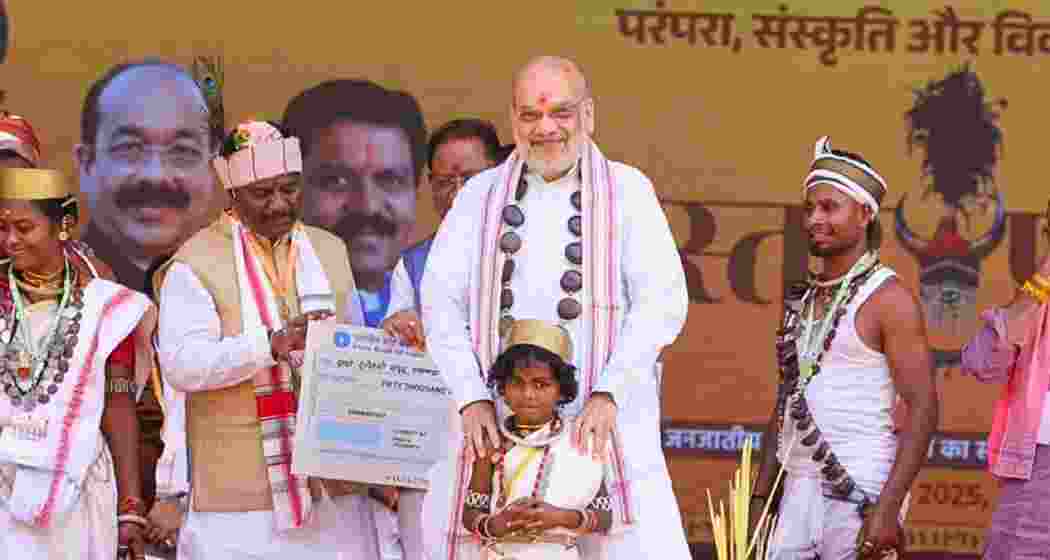Union Home Minister Amit Shah interacts with locals and shares a moment with children in Jagdalpur during his visit to the Bastar region of Chhattisgarh.