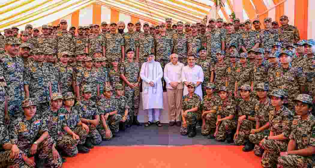 Union Home Minister Amit Shah with BSF personnel stationed at the G-6 and G-13 Border Outposts along the Indo-Pak International Border in Bhuj, Gujarat, on Friday. 