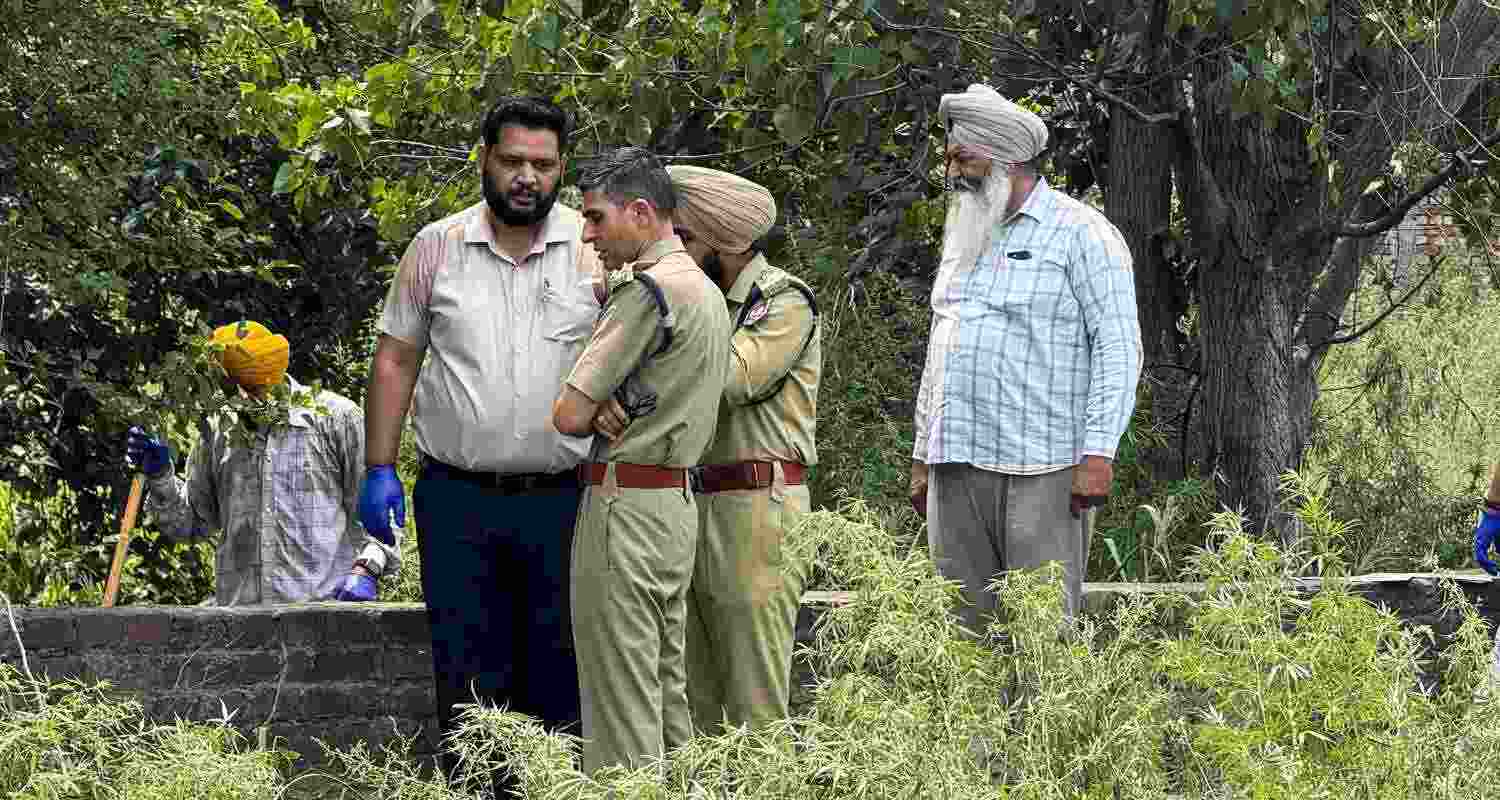 Police and a forensic team at blast spot at Majitha Road in Amritsar on Tuesday.