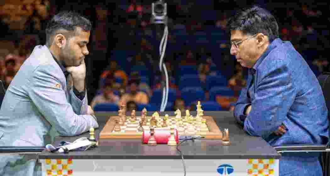 Viswanathan Anand and Arjun Erigaisi at the Tata Steel Chess India Blitz at Dhono Dhanyo Auditorium. Viswanathan Anand and Arjun Erigaisi at the Tata Steel Chess India Blitz at Dhono Dhanyo Auditorium.