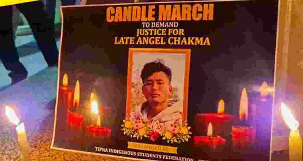 A condolence poster for Anjel Chakma is displayed during a protest demanding a national anti-racism law and swift justice after the Tripura student was brutally killed in Dehradun.