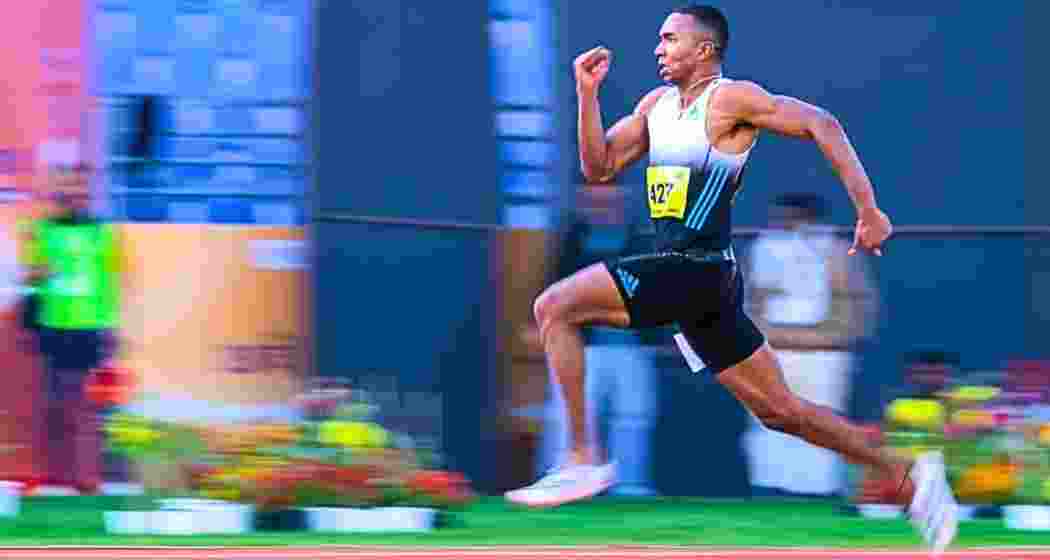 Animesh Kujur sprints during the men’s 200m event at the National Inter-State Championships.