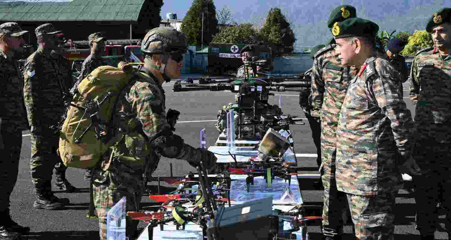 Army Chief during his visit to the Black Cat Division. 