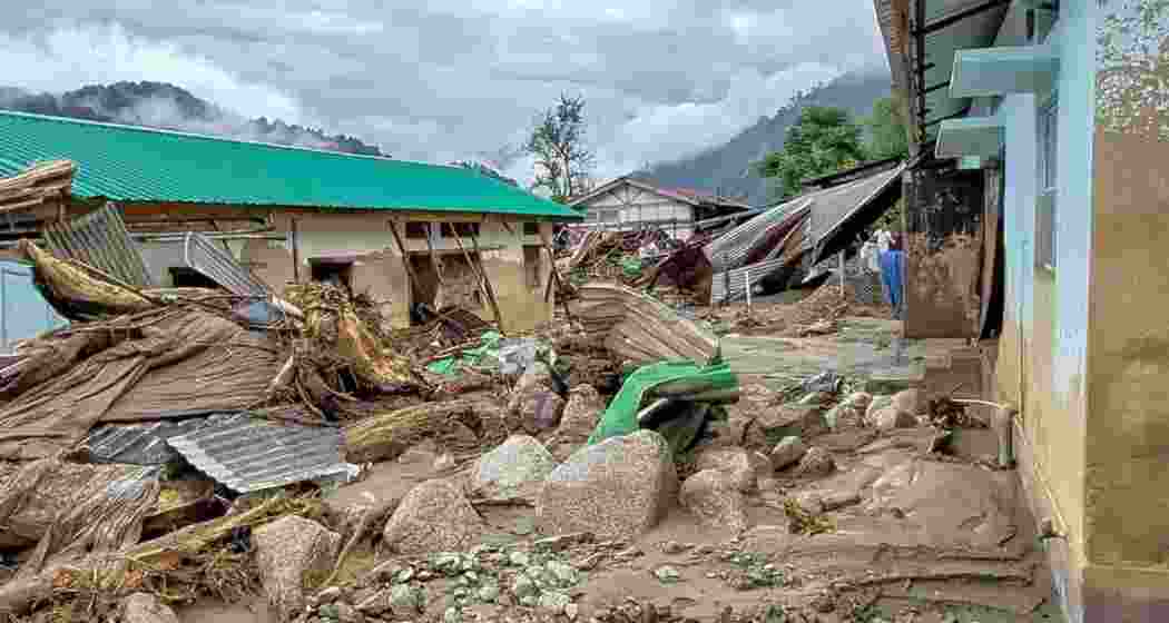 Widespread devastation caused by flash floods and heavy rainfall at NEEPCO colony, in Keyi Panyor on June 24, 2026. (ANI)