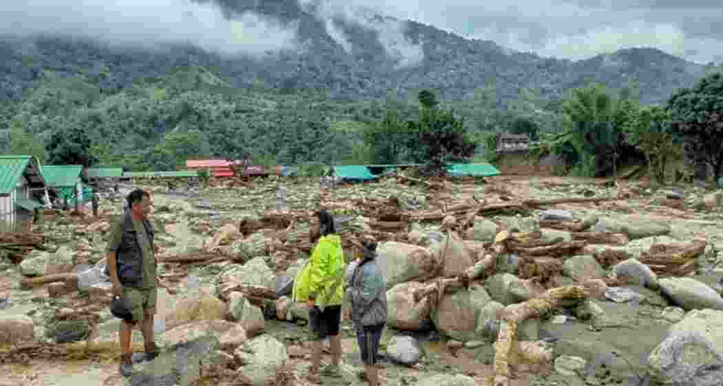 Devastation caused by heavy rainfall and flash floods at the NEEPCO colony, in Keyi Panyor on Wednesday.