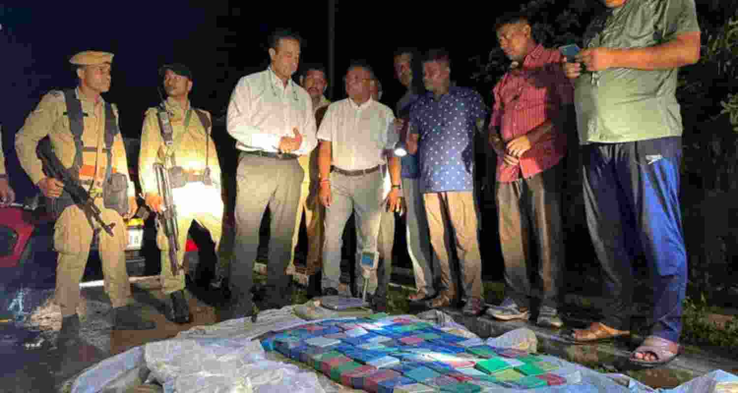 Law enforcement officials make a significant drug seizure after intercepting a vehicle in Silchar, Assam on Thursday. Law enforcement officials make a significant drug seizure after intercepting a vehicle in Silchar, Assam on Thursday.