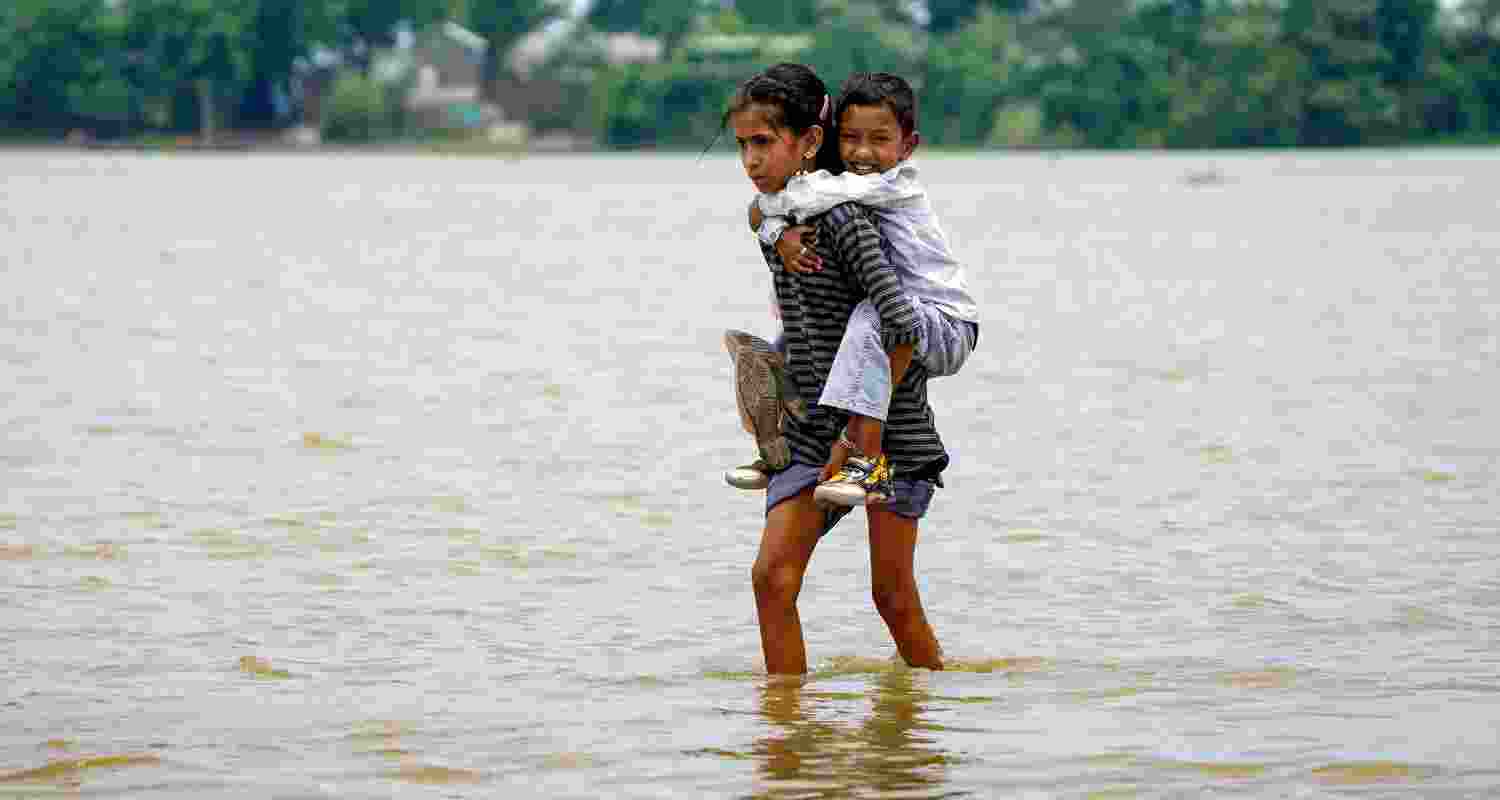 Assam floods have affected over 37,000 people across six districts, killed one person in Sonitpur and submerged crops, damaging homes and roads.