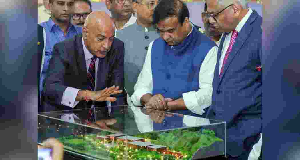 Assam CM Himanta Biswa Sarma and Tata Sons Chairman N Chandrasekaran inspect a replica model of the semiconductor plant in Jagiroad, Morigaon district. Assam CM Himanta Biswa Sarma and Tata Sons Chairman N Chandrasekaran inspect a replica model of the semiconductor plant in Jagiroad, Morigaon district.