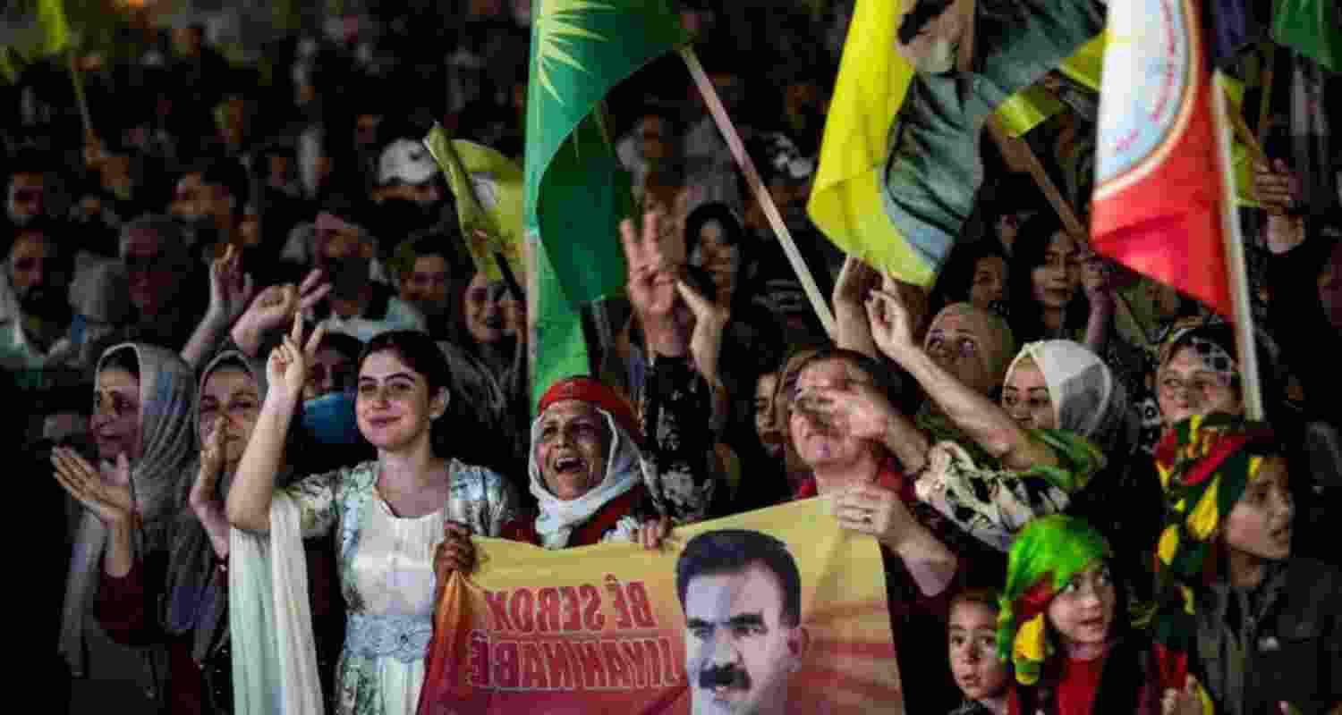 Supporters attend a rally airing a televised statement by the jailed leader and founder of Turkey's Kurdistan Workers' Party (PKK) Abdullah Öcalan in Syria's predominantly-Kurdish northeastern city of Qamishli on Friday.