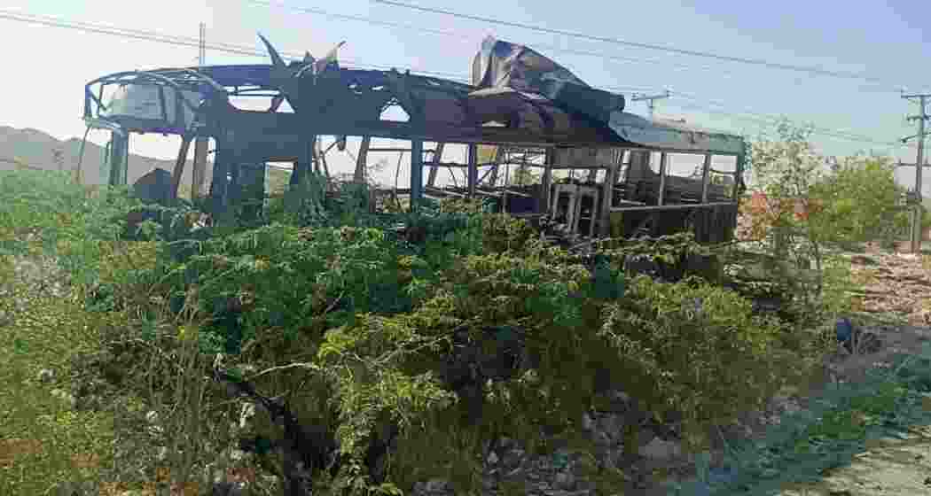 The wreckage of the Army Public School bus after a suicide bombing in Khuzdar, Balochistan, where six children were killed and 38 others injured in a devastating morning attack.