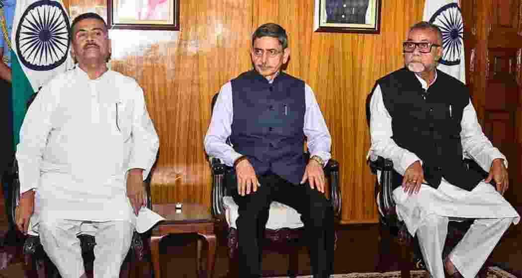 Chief Minister Suvendu Adhikari, West Bengal Governor R.N. Ravi, and Tapas Roy. 