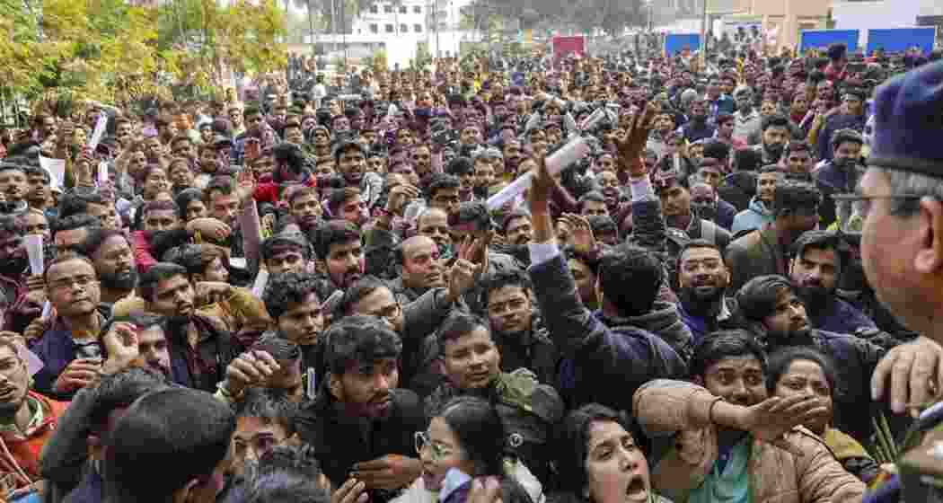 Candidates demonstrate outside the BPSC exam centre in Kumhrar, Patna on Friday, following allegations of a question paper leak. Officials have dismissed the claims, terming the incident a 'conspiracy'.