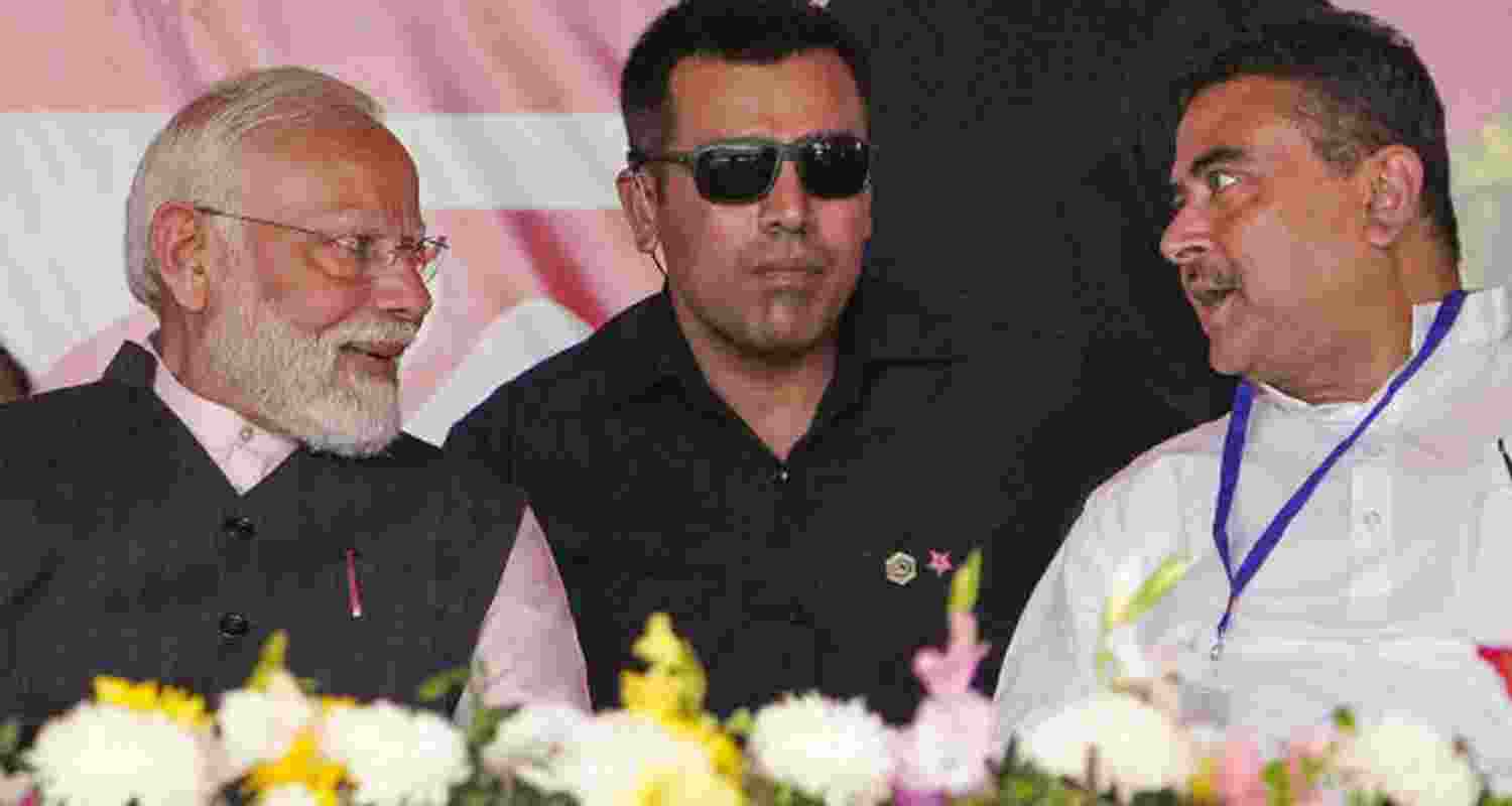 Prime Minister Narendra Modi with Leader of the Opposition in West Bengal Assembly Suvendu Adhikari. 