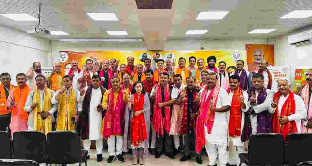 Bharatiya Janata Party supporters celebrate during the counting of votes for the Jammu and Kashmir assembly elections, Jammu, October 8, 2024.