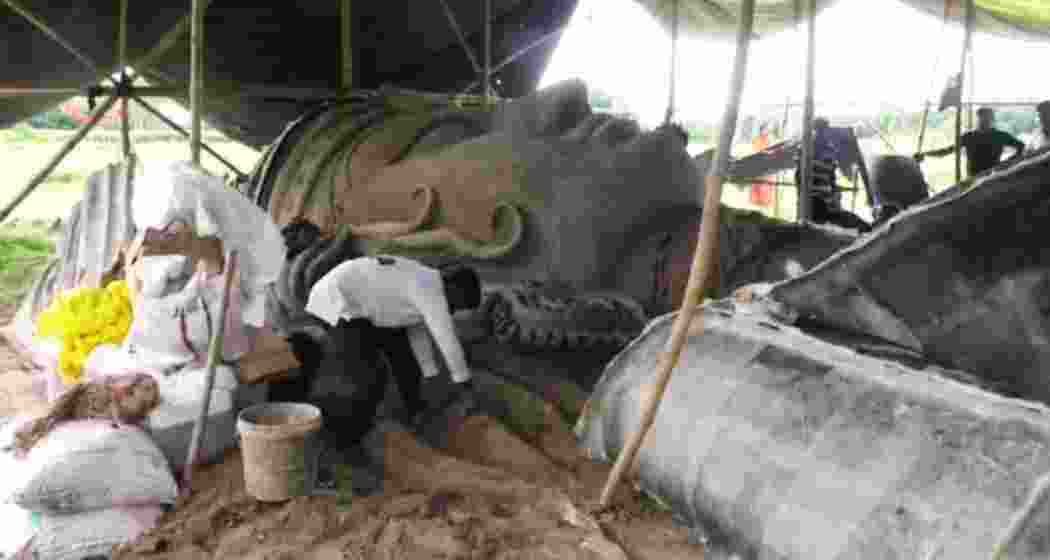 Artisans at work crafting the 125-ft Durga idol in Ranaghat, Nadia district, West Bengal.