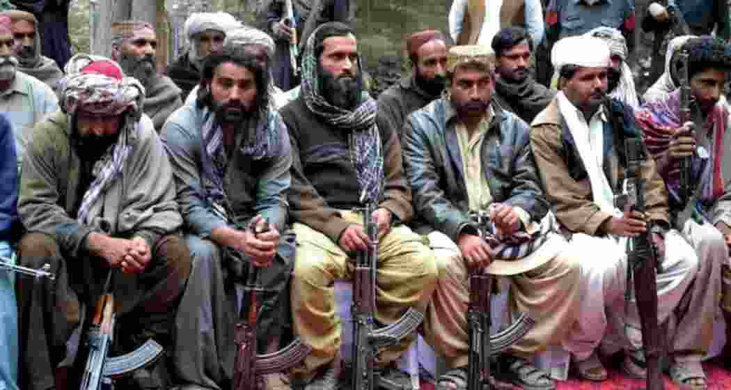 Militants from Baloch Liberation Army and United Baloch Army during a surrender ceremony in Quetta.