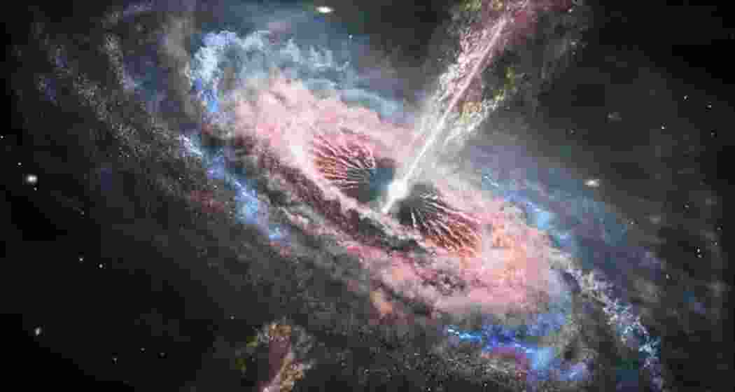 Astronomers have captured the first-ever image of two supermassive black holes orbiting each other within quasar OJ287, revealing a rare cosmic dance nearly five billion light-years away. (Representative image)
