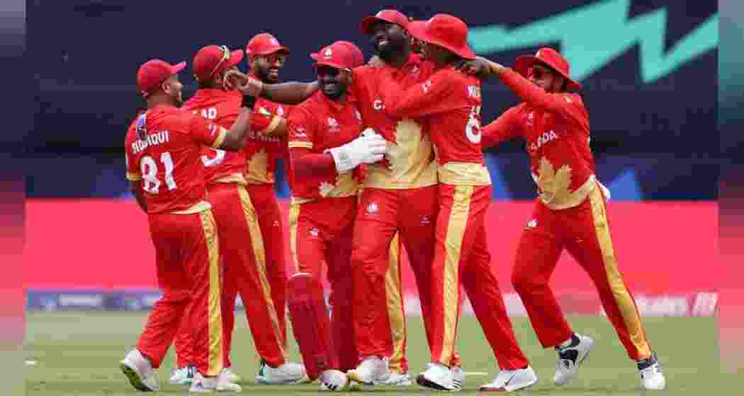 Canada’s players celebrate their World Cup qualification at the Maple Leaf Ground in King City after defeating the Bahamas to top the Americas Qualifier table with a perfect win record.