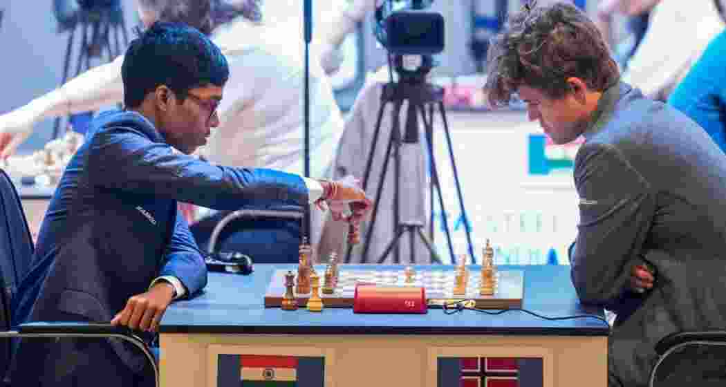 Five-time world chess champion Magnus Carlsen of Norway and Indian Grandmaster R Pragganandhaa on the Day 1 of Tata Steel Chess India Rapid, in Kolkata, Wednesday. Five-time world chess champion Magnus Carlsen of Norway and Indian Grandmaster R Pragganandhaa on the Day 1 of Tata Steel Chess India Rapid, in Kolkata, Wednesday.