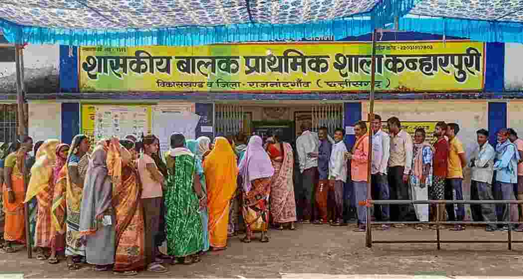 Voters wait in a queue to cast their votes at a polling station in Chhattisgarh. File photo.
