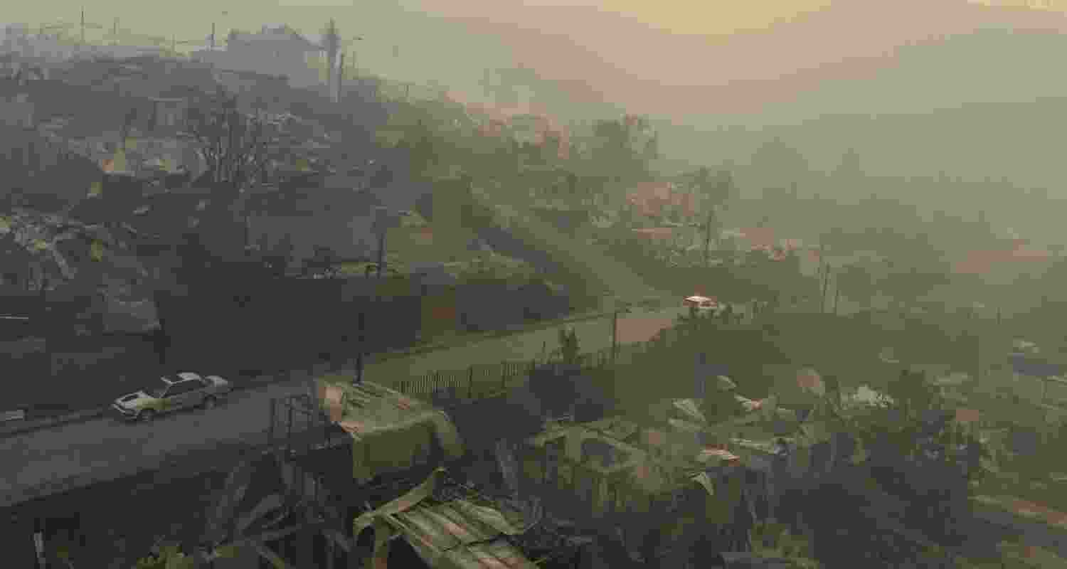 Firefighters were struggling to extinguish the flames, but strong winds and scorching weather hampered their efforts Sunday with temperatures topping 38 degrees Celsius