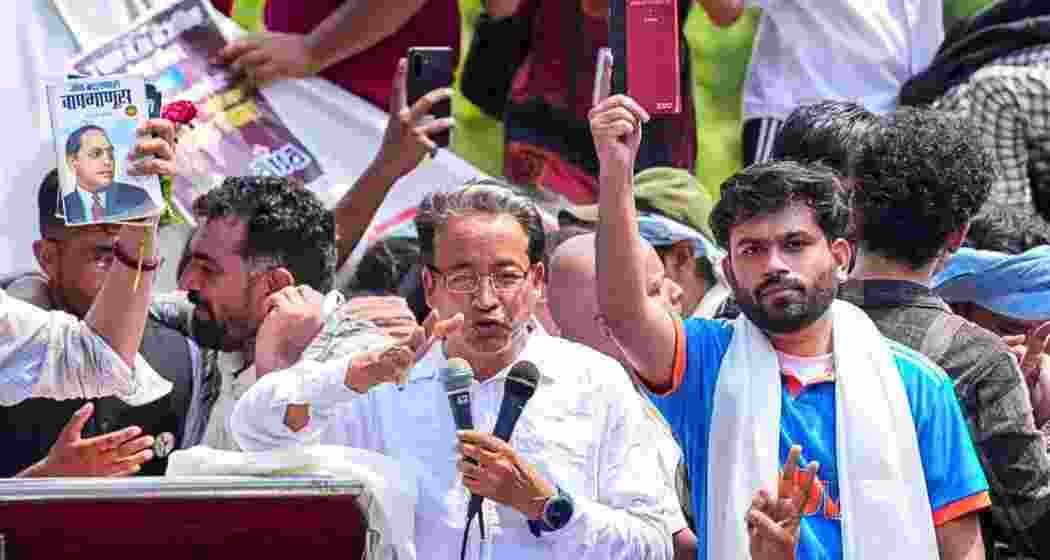 Activist Sonam Wangchuk joins CJP founder Abhijeet Dipke and supporters during the Cockroach Janta Party's protest over alleged NEET-UG irregularities at Jantar Mantar in New Delhi.