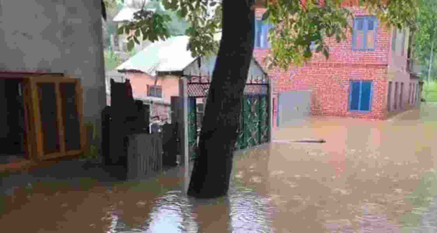 A cloudburst triggered flash floods in Shopian, inundating homes and a school as rescue teams evacuated residents and assessed damage amid heavy rain.