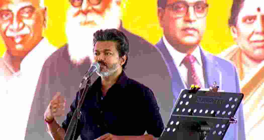 Tamil Nadu Chief Minister C. Joseph Vijay addresses a gathering during his visit to Karur on Friday, where he reiterated the state's opposition to the proposed delimitation exercise.