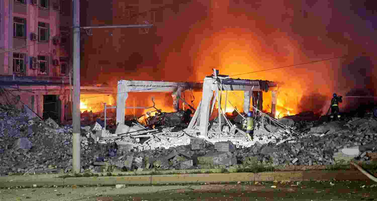 Ukrainian firefighters put out a blaze in Dnipro after a missile attack by Russia.