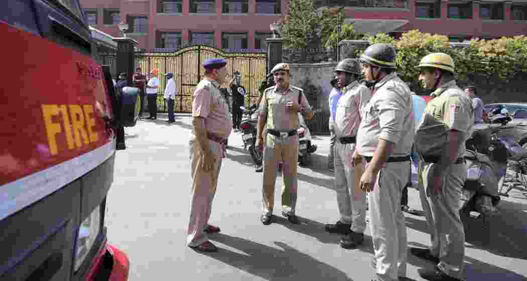 Police and fire department personnel outside Mother Mary’s School at Mayur Vihar after multiple schools received a bomb threat, in New Delhi back in May last year. File photo.