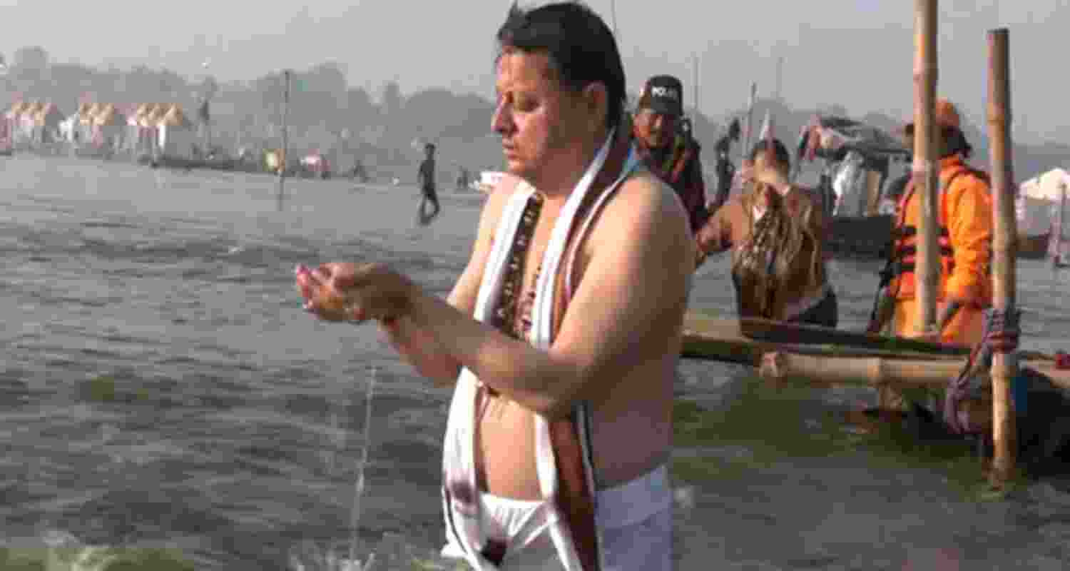 Uttarakhand CM Dhami takes holy dip in sangam with family Uttarakhand CM Dhami takes holy dip in sangam with family