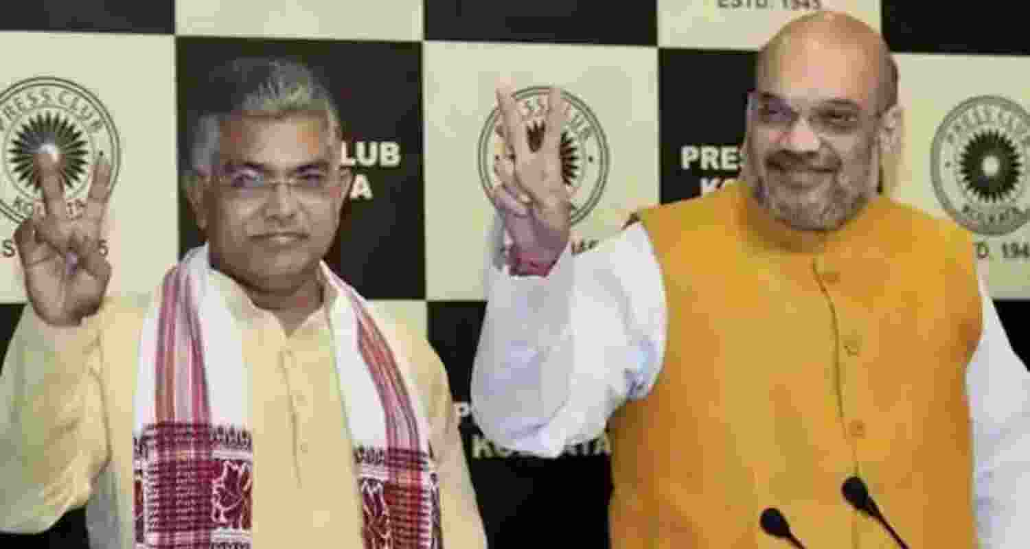 Union Home Minister Amit Shah with West Bengal BJP leader Dilip Ghosh - file image.