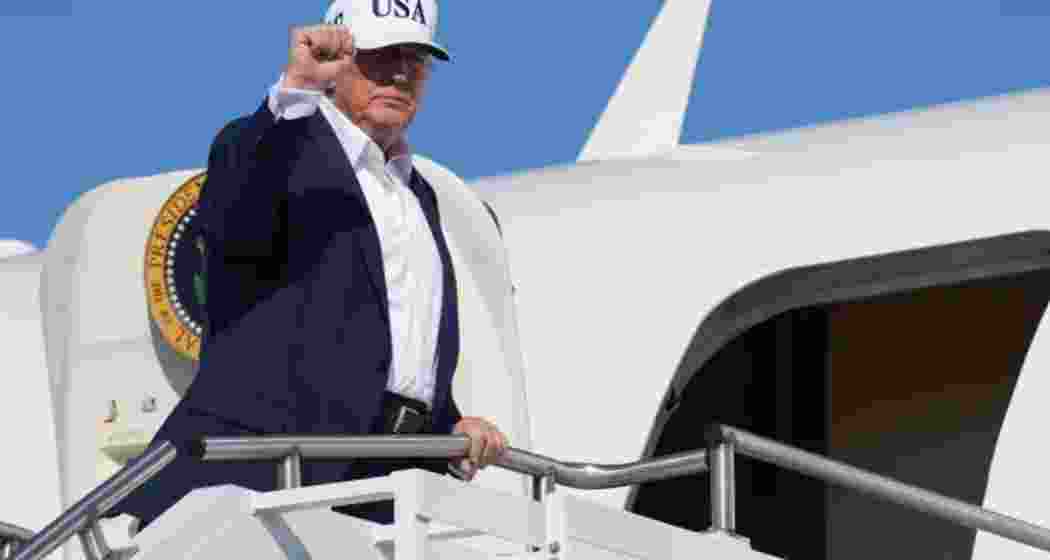 President Donald Trump gestures as he boards Air Force One. (File photo)