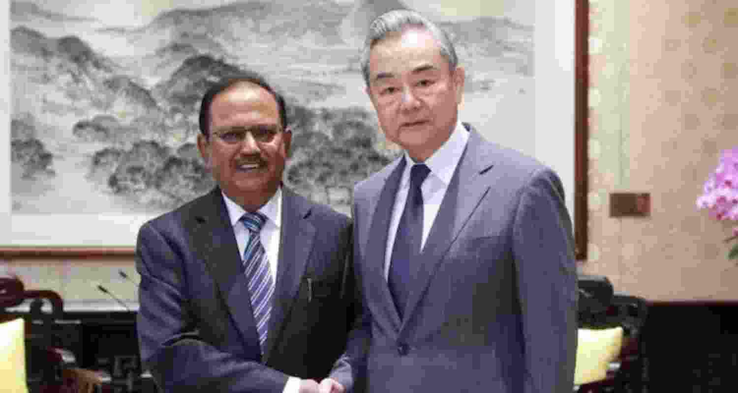 National Security Advisor Ajit Doval meets Chinese Foreign Minister Wang Yi in Beijing.