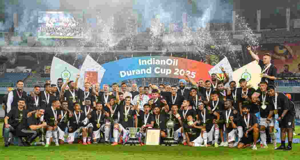 NorthEast United players celebrate victory over Diamond Harbour FC.