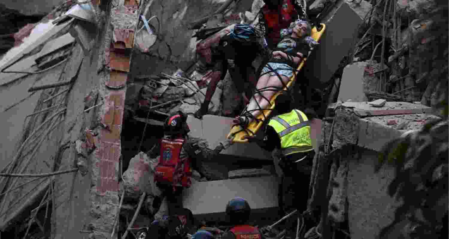 Venezuela hit by fresh 4.9 magnitude quake, as search for missing continues