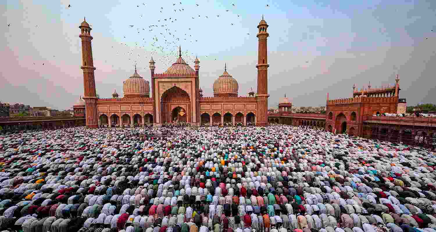 Muslim devotees offer 'namaz' during Eid-ul-Fitr celebrations, at Jama Masjid, in New Delhi, Thursday Muslim devotees offer 'namaz' during Eid-ul-Fitr celebrations, at Jama Masjid, in New Delhi, Thursday