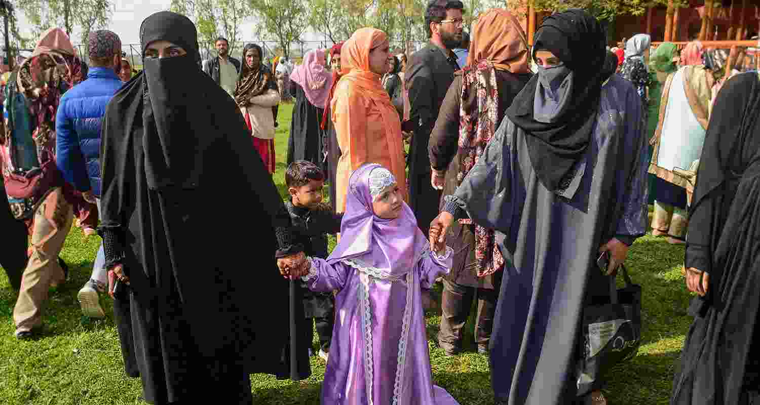 Muslims celebrate Eid-al-Fitr, at the historic Aali Masjid Eidgah, in Srinagar Muslims celebrate Eid-al-Fitr, at the historic Aali Masjid Eidgah, in Srinagar