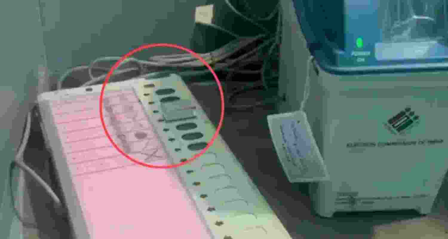 Screengrab from the video shows BJP button being blocked with a tape in a booth in Falta, Diamond Harbour.