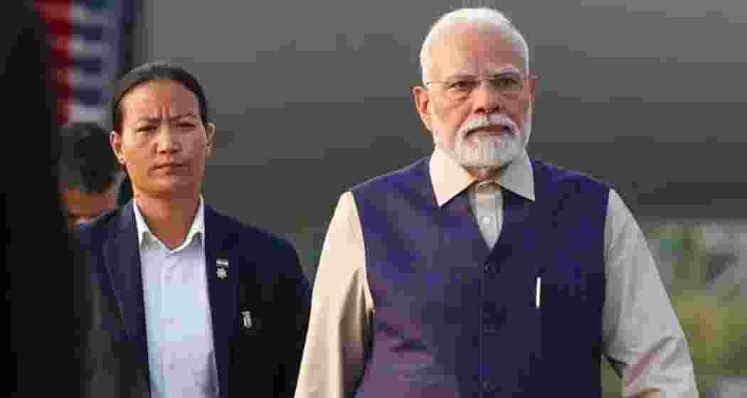 Inspector Adaso Kapesa, seen guarding Prime Minister Narendra Modi during his UK visit.