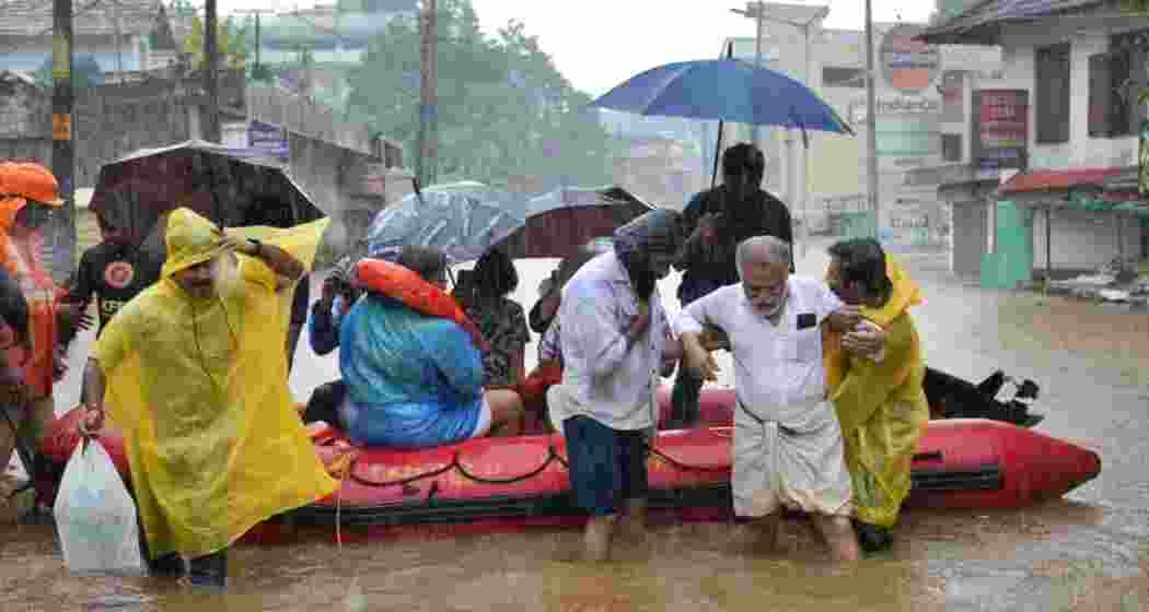 Rescue work under way at the flooded Ranni town in Pathanamthitta on Saturday.