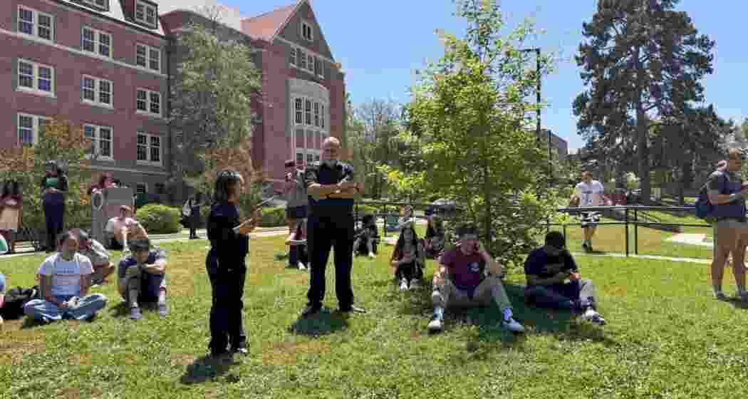 Florida State University students await updates during an active shooter situation near the student union in Tallahassee. Police responded swiftly as the university issued a lockdown and emergency alerts. Florida State University students await updates during an active shooter situation near the student union in Tallahassee. Police responded swiftly as the university issued a lockdown and emergency alerts.